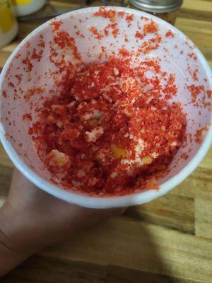 Hot cheetos corn in a cup