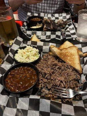 Chopped beef dinner with baked beans and coleslaw