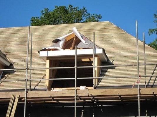 Roof scaffolding during job