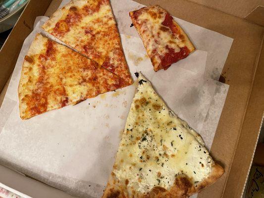 2 Neopolitan Pizza Slices, 1 White Slice and the saddest looking Sicilian Slice.