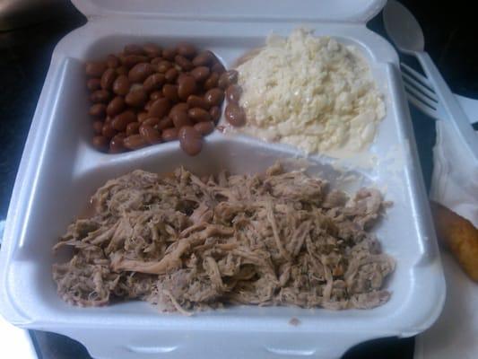 The BBQ Barn's Chopped BBQ Plate with slaw and pintos.