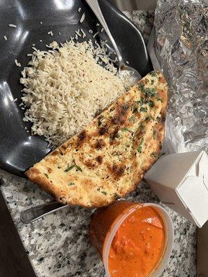 Butter Chicken basmati rice and garlic naan.