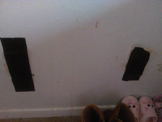 These are two light sockets that I have had to cover with black duct tape so my daughter will not be electrocuted.