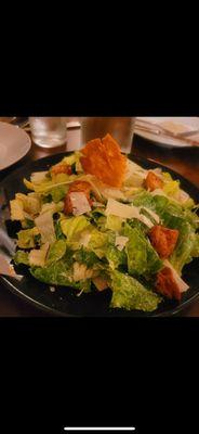 Classic Caesar Salad topped with homemade croutons and Parmesan Tuile