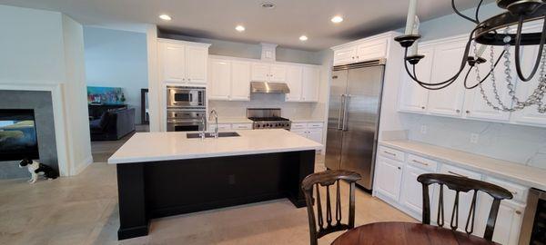 cabinets after refinishing in hybrid  paint 2 tone look! colors change everything!!