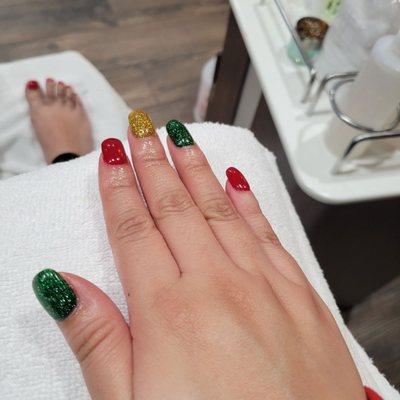 Holiday themed dip manicure and regular pedicure.