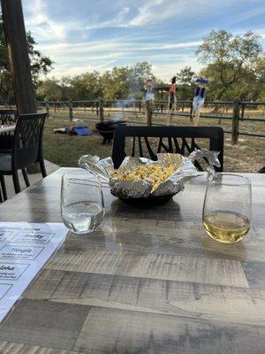 Popcorn, wine, and a fire.