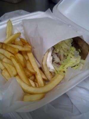 Gyro ( Tzatziki sauce(cucumber and sour cream), lettuce, tomato, onion and gyro meat in pita bread) - $6.95