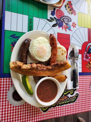 Bandeja Paisa...tradional dish of the Colombian department (state) of Antioquia. The very state that is home to Medellin, Colombia.