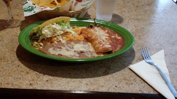 The number 19. Enchilada, taco, rice, beans.