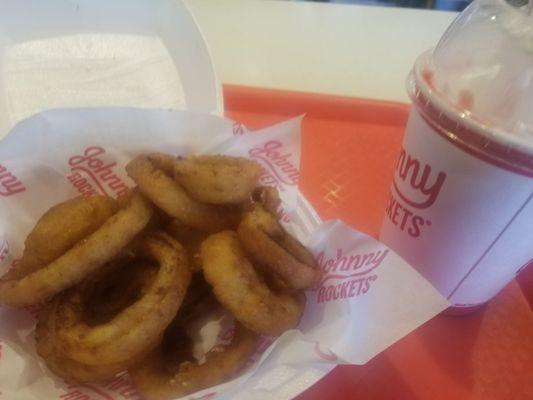 Onion  rings and strawberries  milkshake living life over here