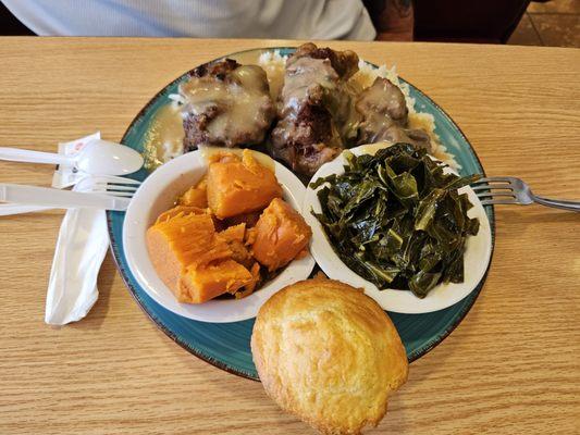 Ox tails with smothered rice. Yams and greens and muffin.