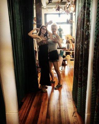 Sammy and I putting up heavy mirrors in the dressing rooms.