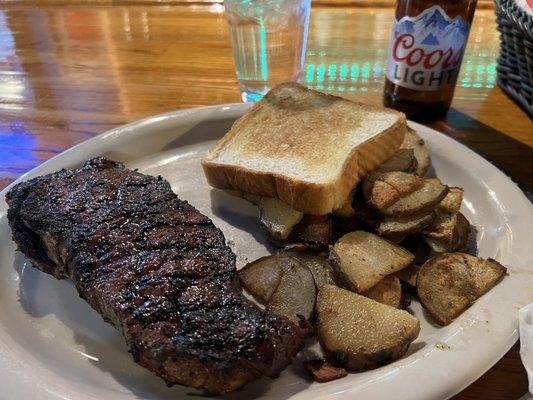 Strip w/Texas toast and fried potatoes