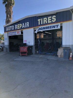 Service bay of Johns Auto on corner of Victory and Lindley