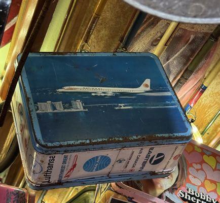 They have vintage lunch boxes hanging from the ceiling. My mom was a flight attendant for National Airlines.