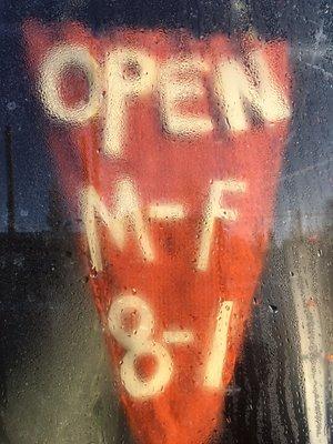 Open hours flag, with chilly window condensation :)