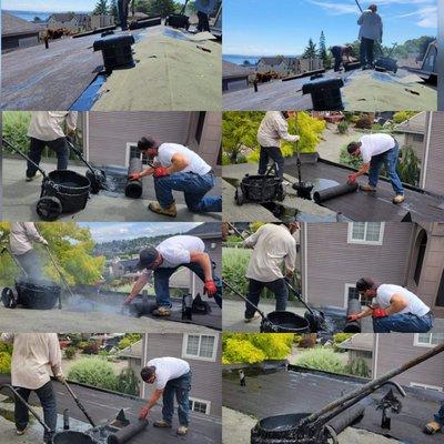 Removal of old roof and brand new hot tar roof applied.