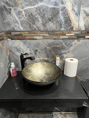 Beautiful and clean sink in the woman's restroom