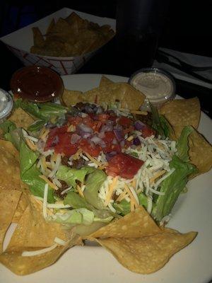 Taco salad served with extra warm tortilla chips