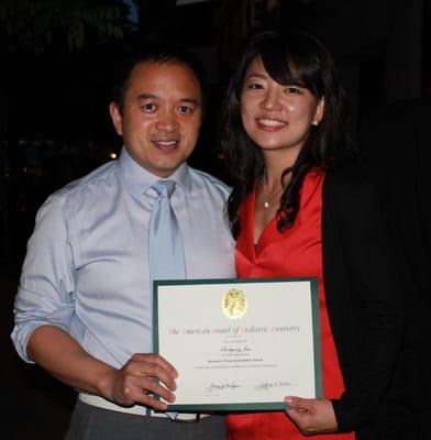 Dr. Chu with this resident, Dr. Jun and the award for scoring top 3% on the pediatric dental written board exam- congrats!