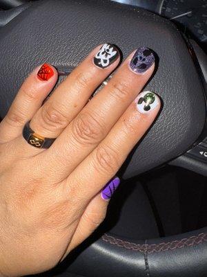 Disney Halloween nails done by Traci.