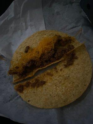 This is what a taco with no lettuce and " extra" cheese looks like. (Not what it should look like)