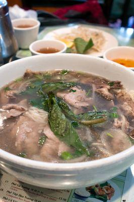 #1 Pho Beef Noodle Soup Extra Big Bowl ("Train" Pho): $13.95; $15.19 with tax. Slightly obscured by steam.