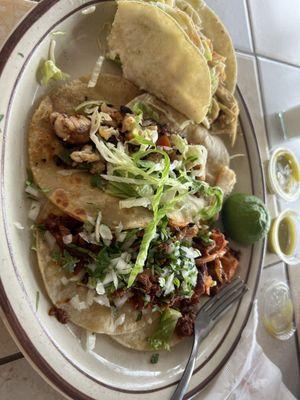 Chicken, fish and al pastor tacos