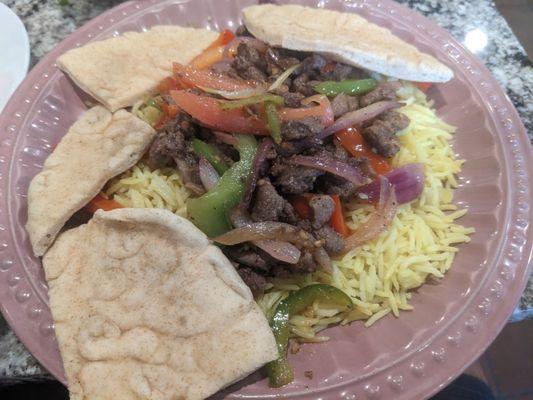 Lamb Kebab plate with rice.