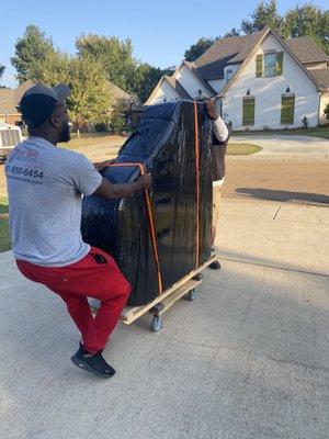 Moving baby grand piano