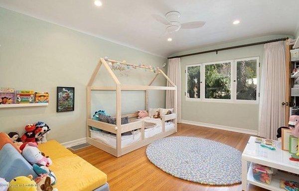 Custom drapes and sheers in child's bedroom.