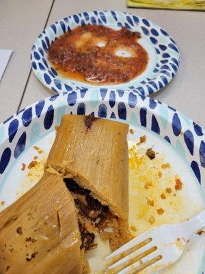 Beef tamale with red sauce and some of their great salsa