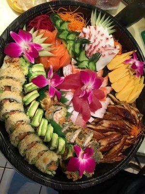 Holiday Sushi Party Tray ordered by friends.  Happy holiday with best wishes of health and happiness from Jieyi Sushi $$$$$