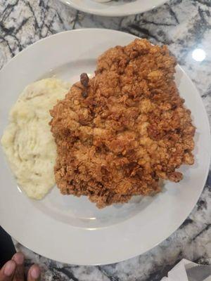 Chicken fried steak and mashed potatoes