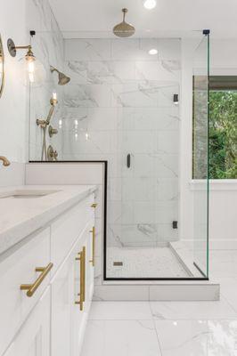 White Tile and Gold Accent Bathroom Remodel