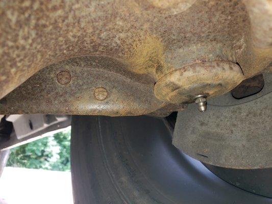 Notice the ware indicator on the bottom of the ball joint clearly sticking down clearly nothing wrong with it.