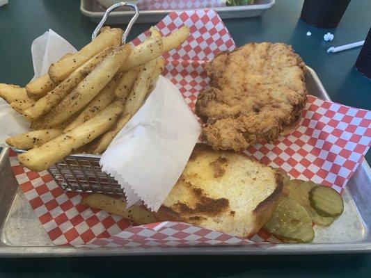 The Tenderloin Sandwich.  Bigger than it looks.  And hand breaded like they claim.