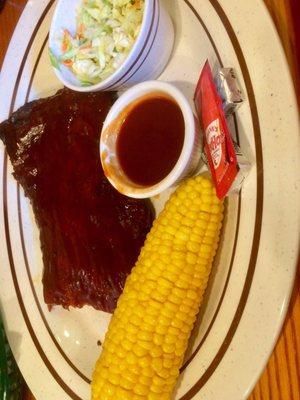 Half rack St. Louis Ribs with corn on the cob & cole slaw.