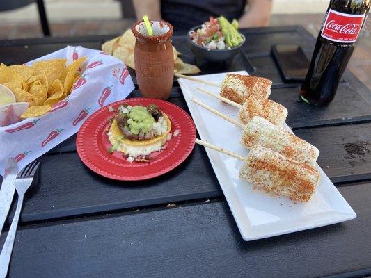 Elotes, tipsy taco w carnitas and ceviche.