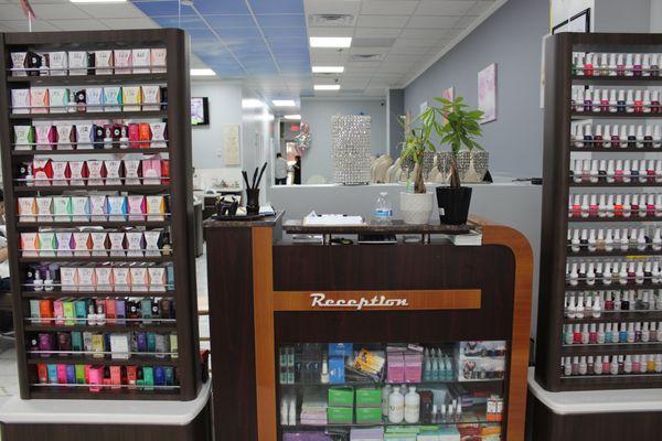 The first thing you'll see upon arrival is our reception, lined with nail polishes. We ask you to sign in and someone will assist you!!