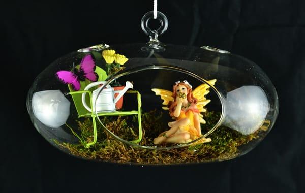 Our glass accent containers are unique, making your fairy garden light and whimsical.