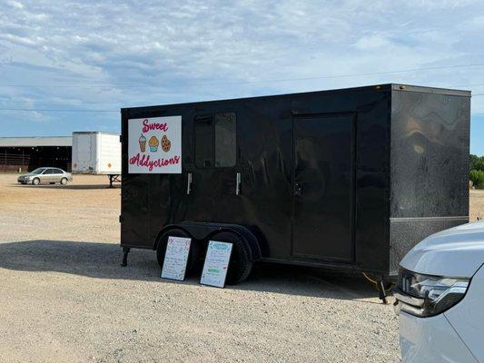 Food truck with menu boards.