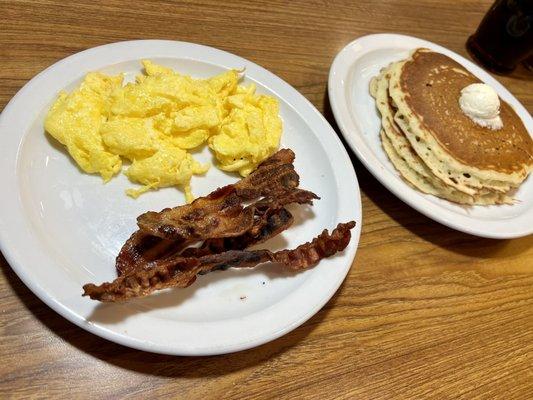 Everyday Value Slam-scrambled eggs, super crispy bacon at my request, and delicious Stack of Pancakes. $5.99. Sweet!!