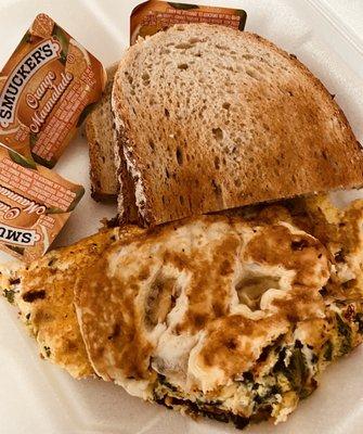 After the morning walk, this spinach feta omelette with rye toast and a side order of grits hit the spot