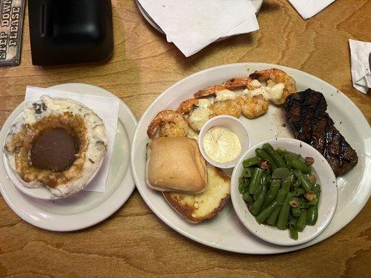 Sirloin steak and shrimp with mashed potatoes