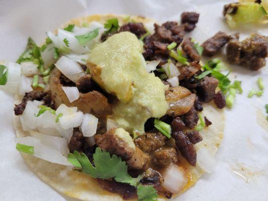 Al pastor, pictured and Carne asada were very good authentic tacos.