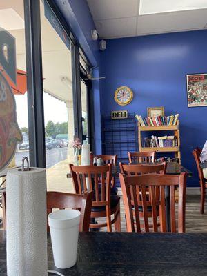 Cute book exchange in indoor dining area of the restaurant.