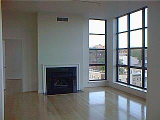 Loft for Rent with fireplace, City views, 2BR/den+2BA for $3200 including garage parking! Near U Street Metro.