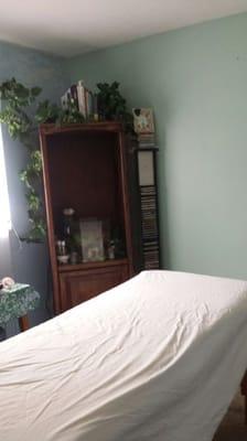 Photos taken with my phone of massage room, fish tank and table.